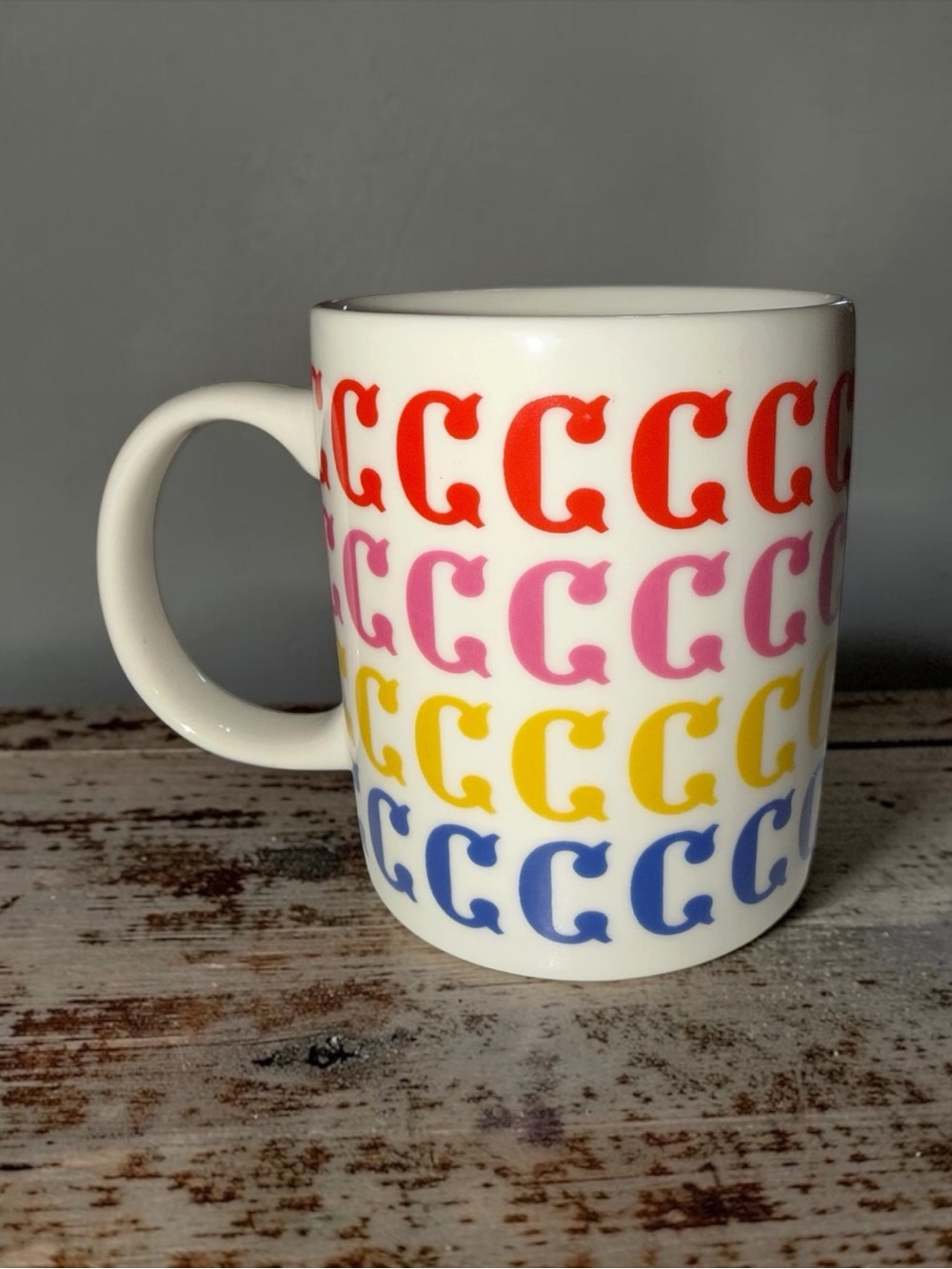 Ashland White Mug with Red, Pink, Yellow, and Blue 'C' Pattern